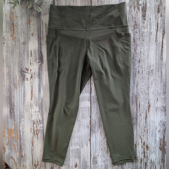 Athleta Salutation Stash Pocket High Rise 7/8 Legging Green Womens Petite Large - Picture 2 of 8